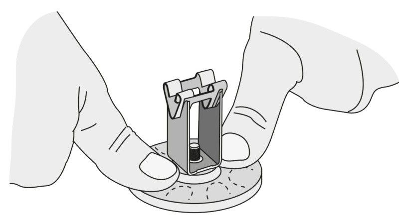 Прижимание прокладки держателя к поверхности